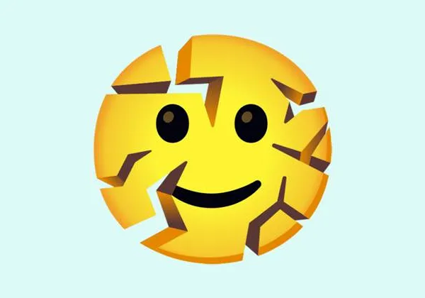 Эмодзи треснувшего улыбающегося лица: новый символ из набора Unicode 18.0 для выражения скрытого эмоционального напряжения
